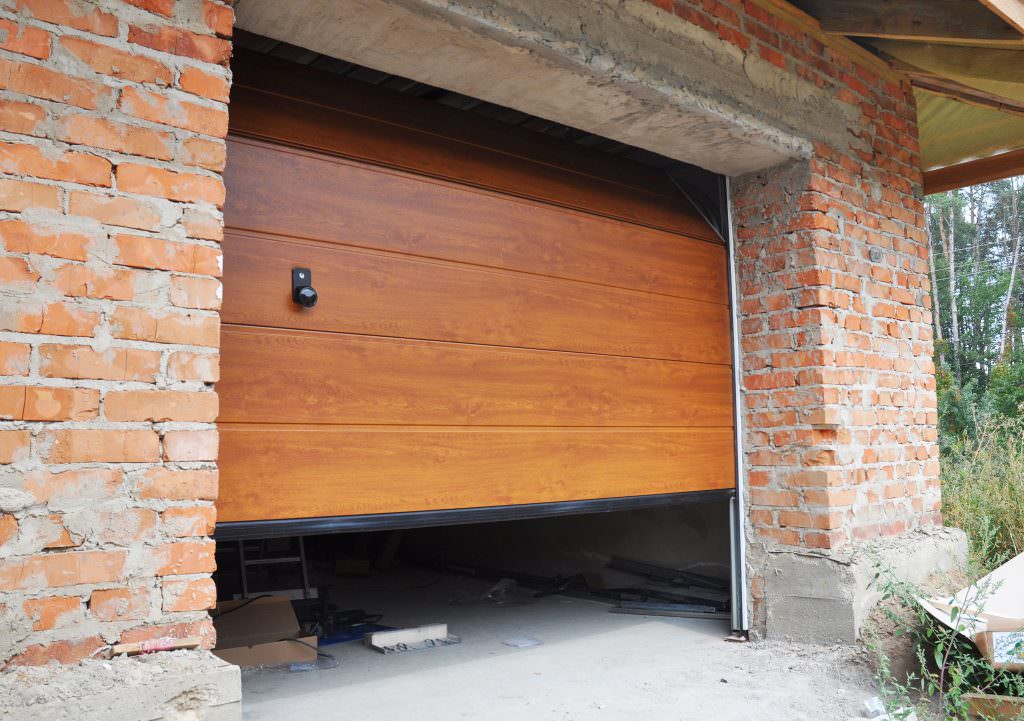 Wood laminated garage door opening up