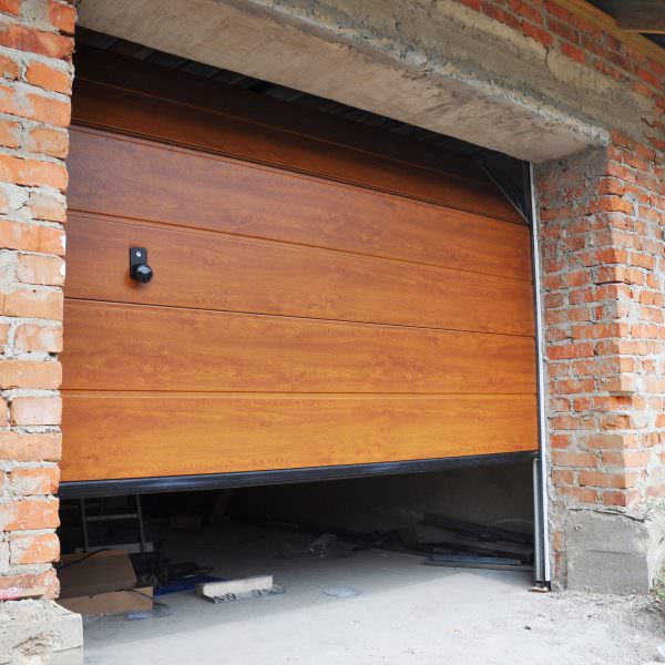 Wood laminated garage door opening up